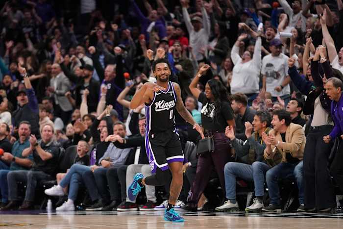 Mar 7, 2024; Sacramento, California, USA; Sacramento Kings guard Malik Monk (0) reacts after making a three point basket against the San Antonio Spurs with 23.1 seconds left in the fourth quarter at the Golden 1 Center. Mandatory Credit: Cary Edmondson-USA TODAY Sports